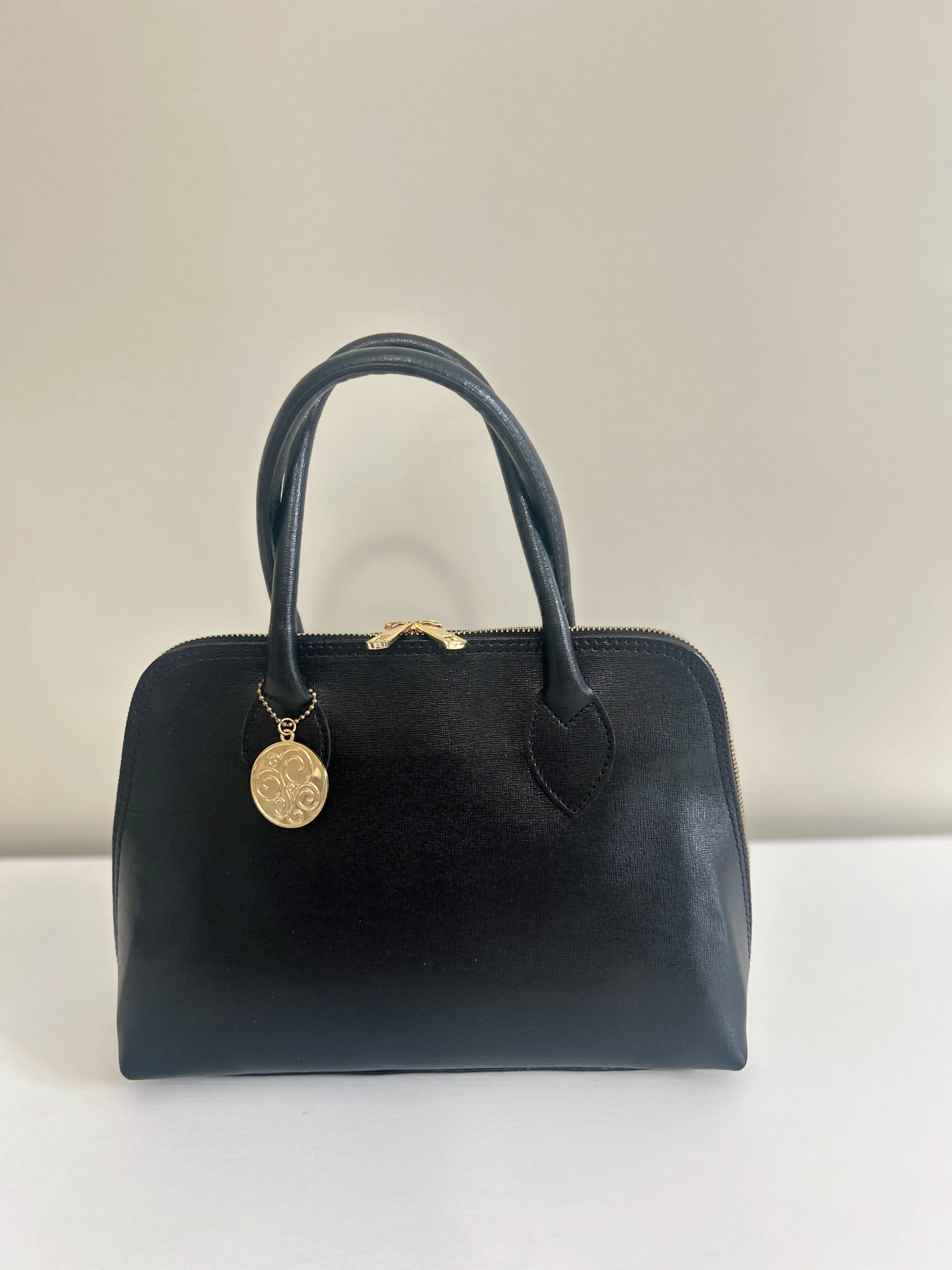 Black Grazia Bella handbag with gold accents